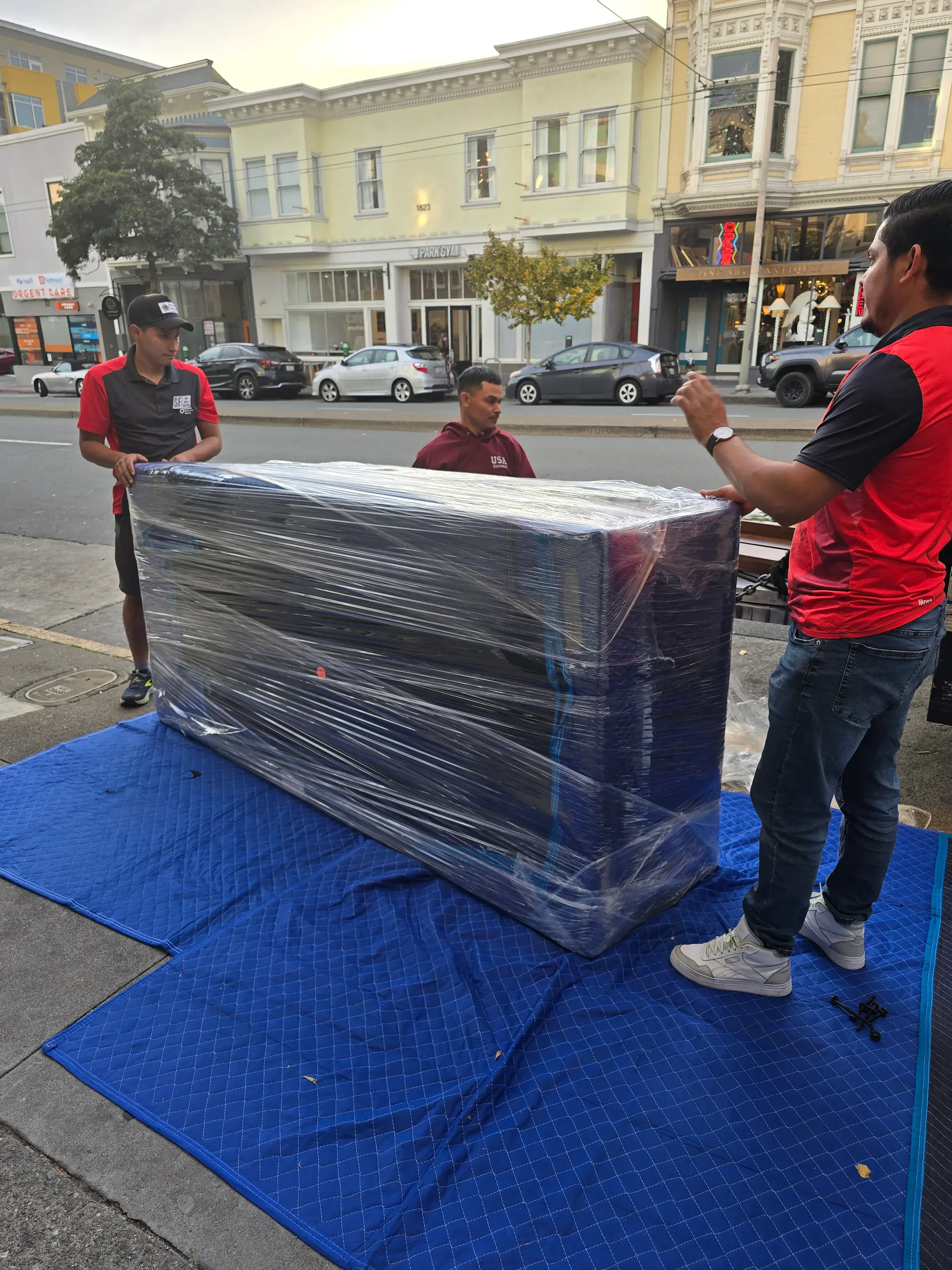 SF Bay Area Moving crew protecting furniture during a residential move