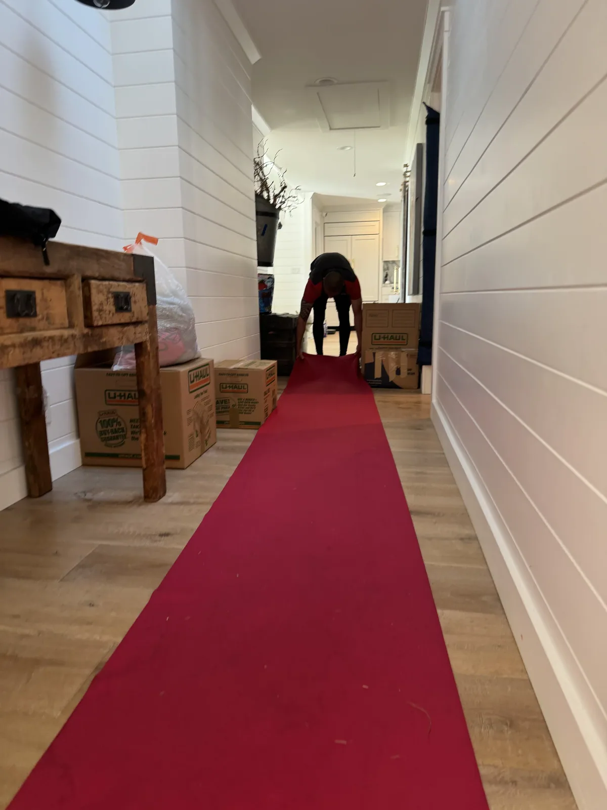 A protected hallway prepared for the moving crew